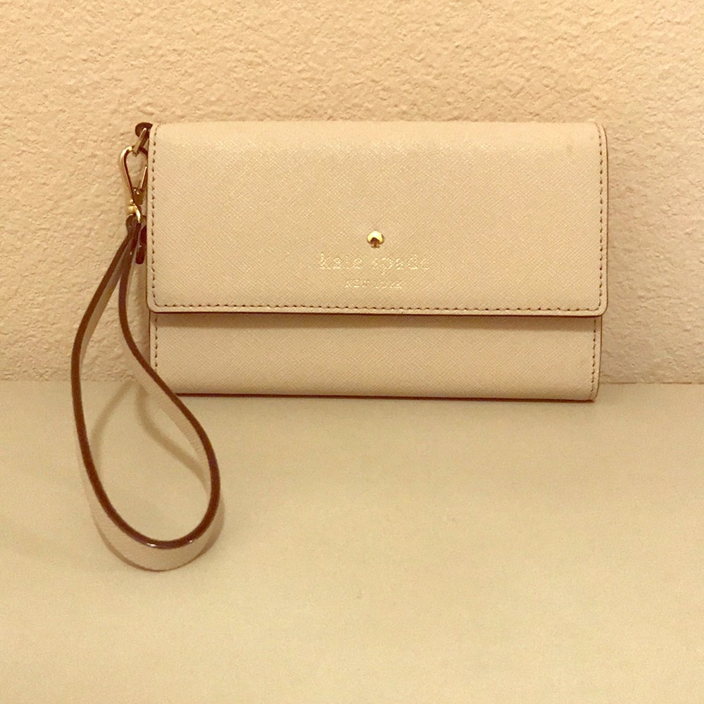 Kate spade tan wristlet.